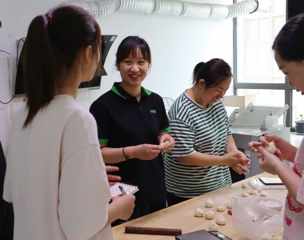 南財招財進“包”團隊三下鄉：數字賦能老字號，轉型升級創未來